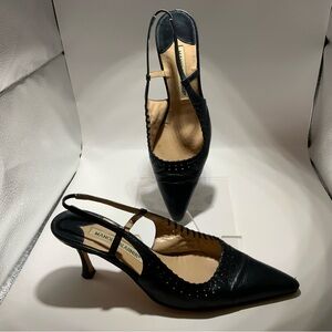 Pre owned Manolo Blahnik navy sling back heels.